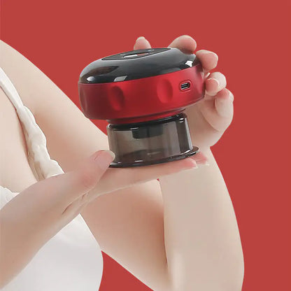 Hand holding a red and black device against a red background